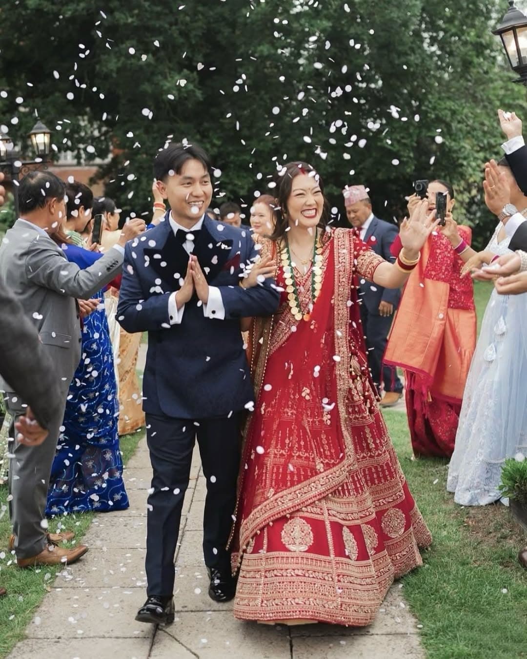 A confetti send-off after an Asian wedding ceremony in the grounds