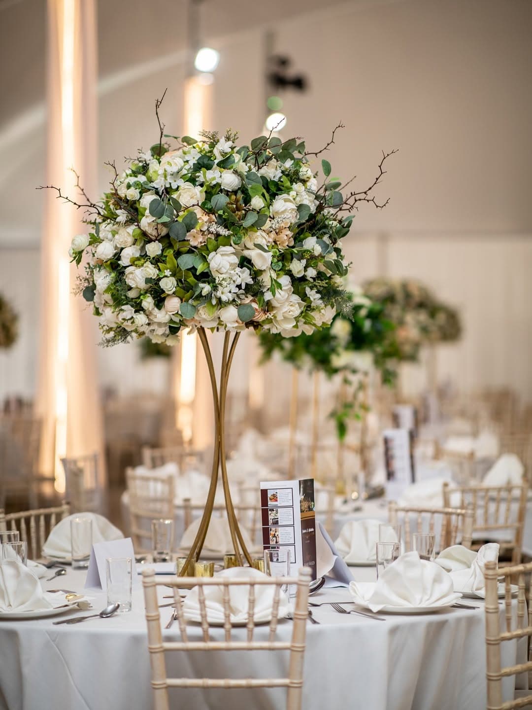 An elegant tablescape beneath the canopy ceiling