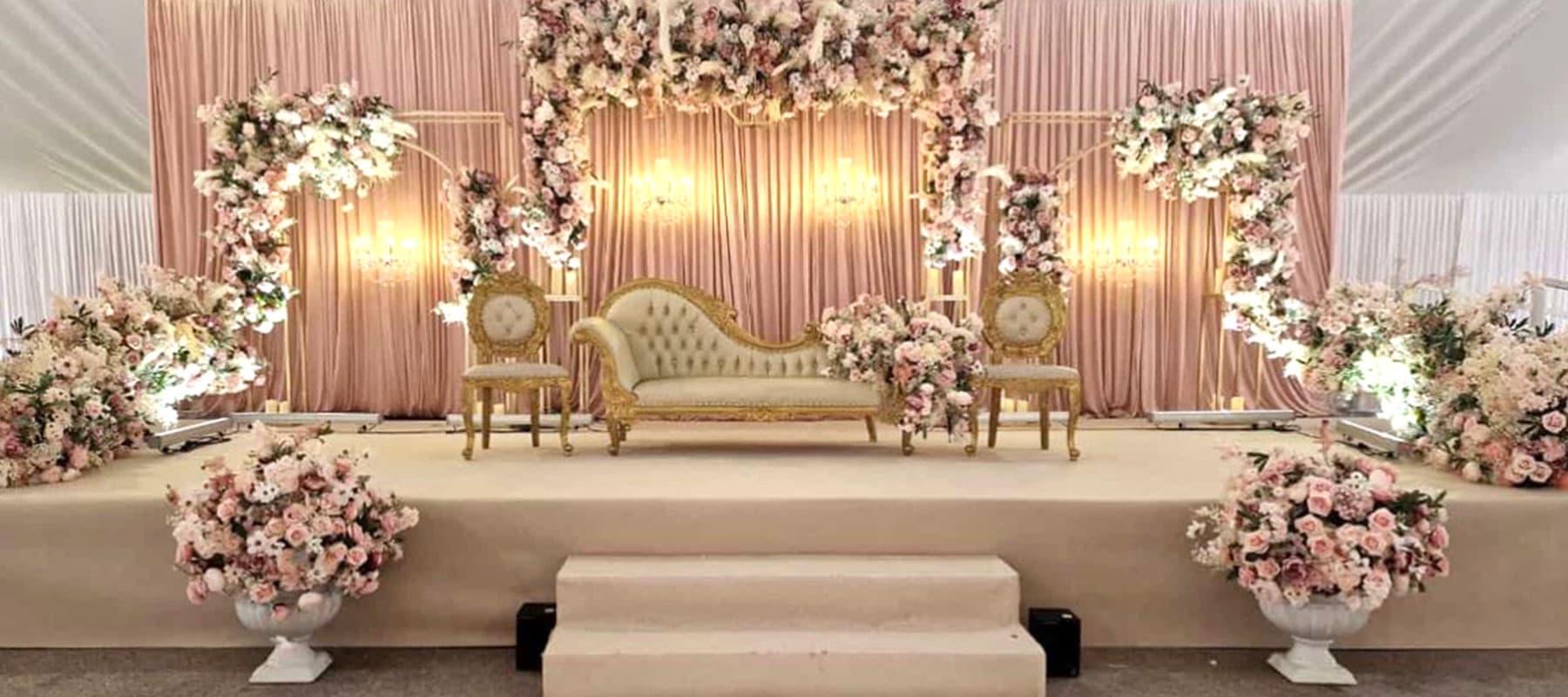 A wedding breakfast laid out beneath the marquee